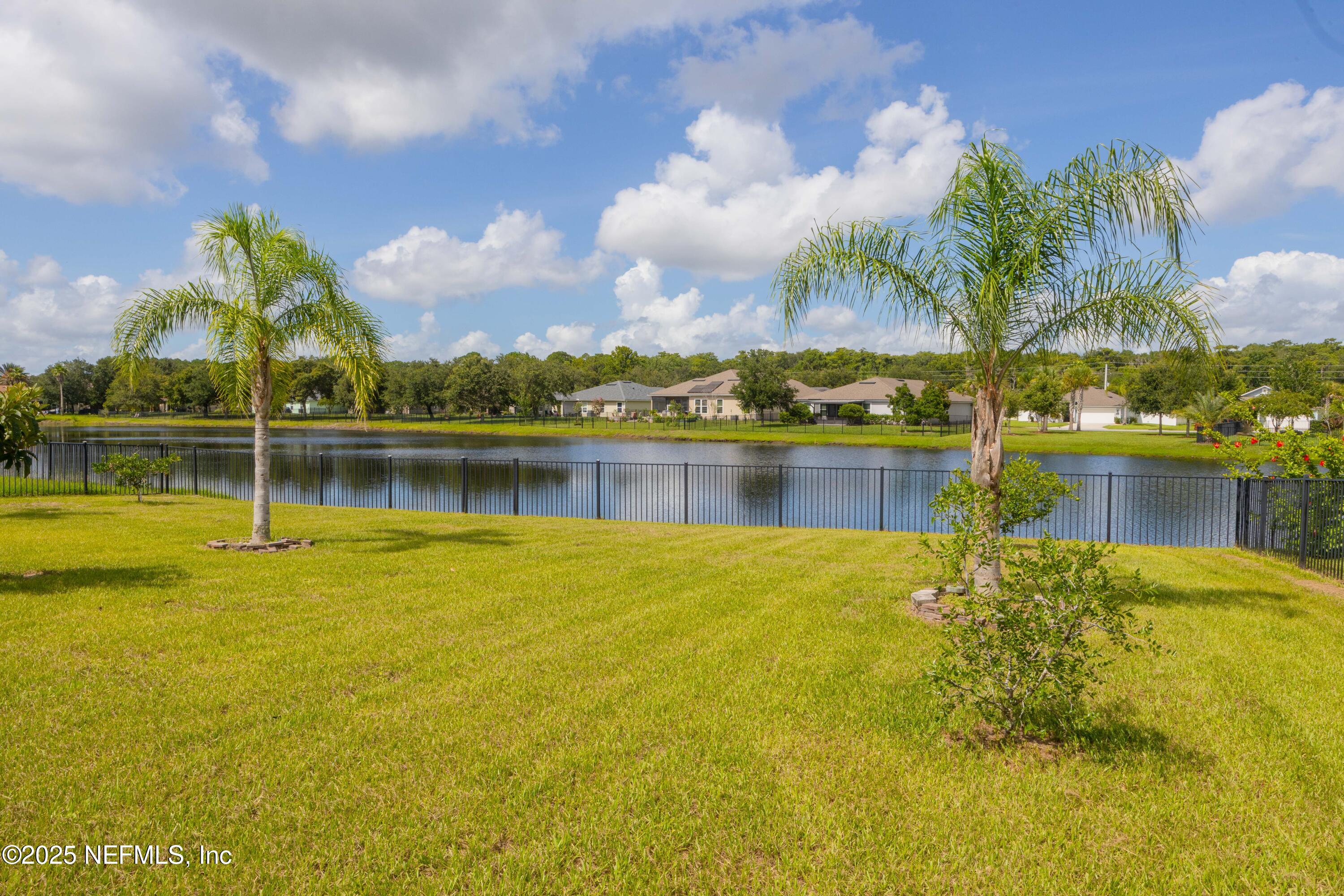 333 Old Hickory Forest Road St. Augustine, FL 32084 - Photo 40 of 62 a view of a lake with a big yard