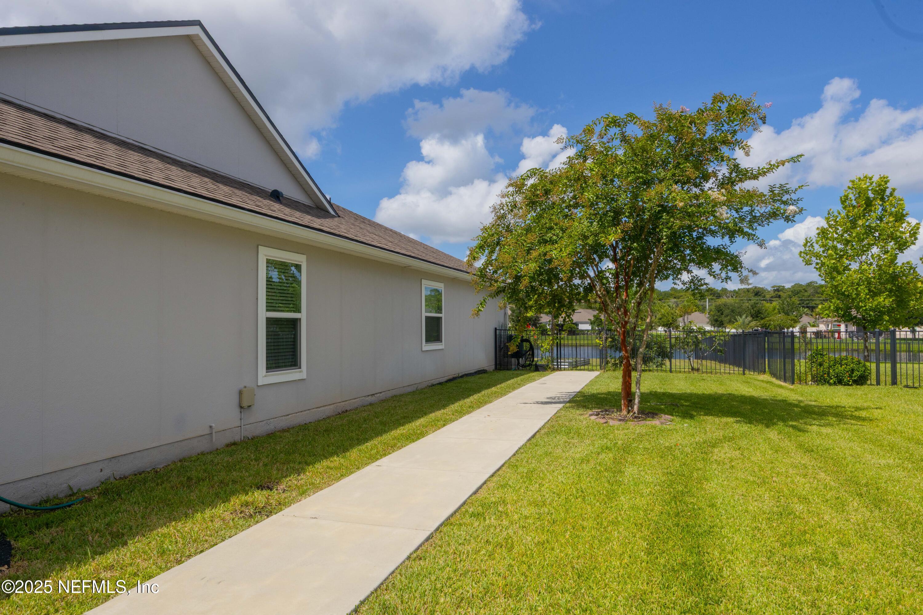 333 Old Hickory Forest Road St. Augustine, FL 32084 - Photo 4 of 62 a house view with a backyard space