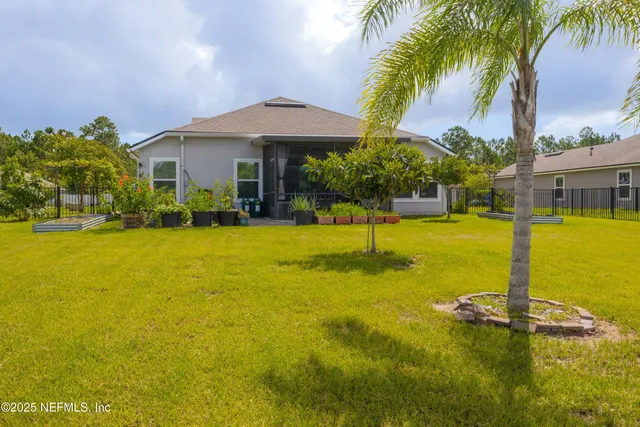 a room with chairs pool table and chairs