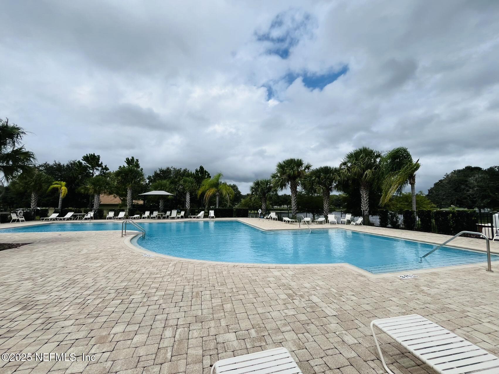 333 Old Hickory Forest Road St. Augustine, FL 32084 - Photo 60 of 62 a view of a swimming pool and an outdoor seating