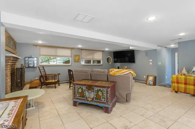 a living room with furniture and a table