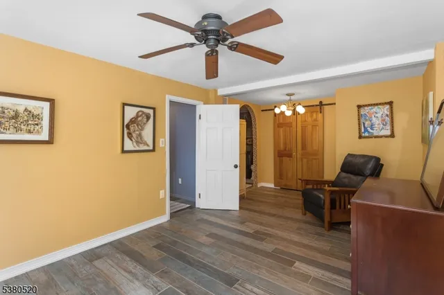 a view of workspace with wooden floor
