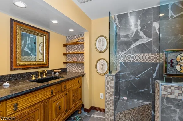 a bathroom with a sink and a mirror