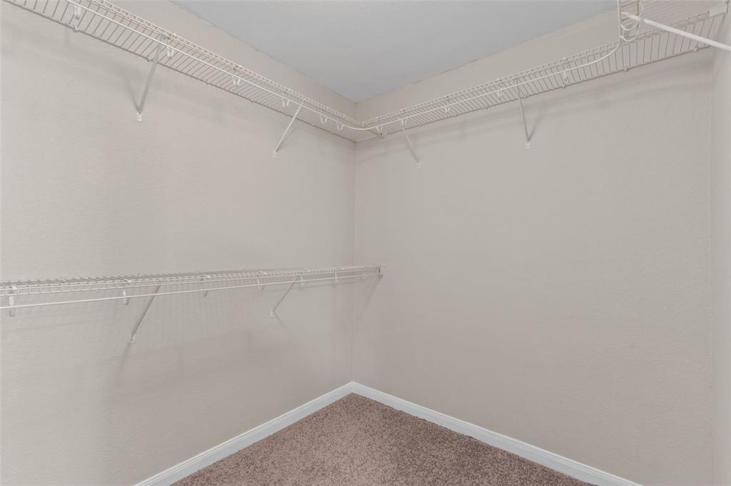 4700 Conley Lane Denton, TX 76207 - Photo 11 of 17 a view of a room with racks on the wall