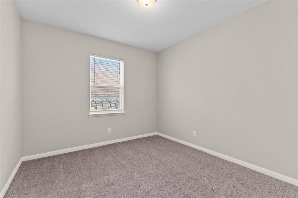 4700 Conley Lane Denton, TX 76207 - Photo 12 of 17 an empty room with a window