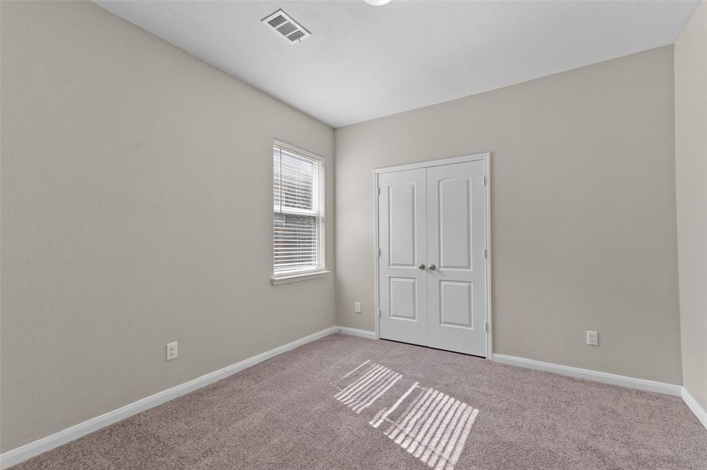 4700 Conley Lane Denton, TX 76207 - Photo 13 of 17 a view of an empty room and window