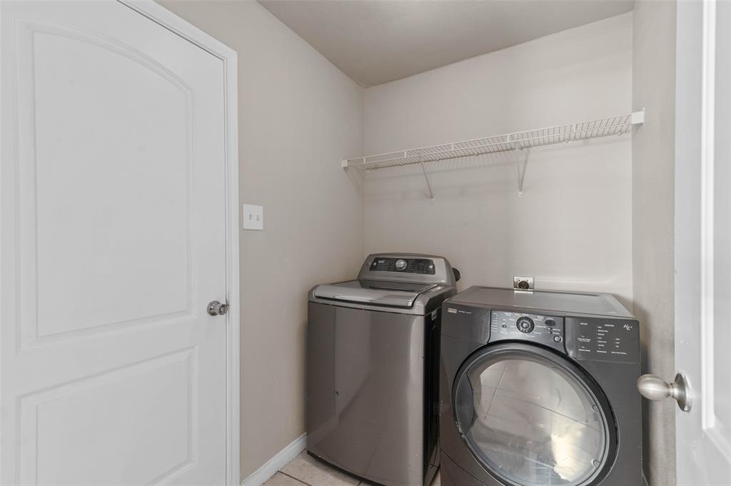 4700 Conley Lane Denton, TX 76207 - Photo 16 of 17 a utility room with dryer and washer