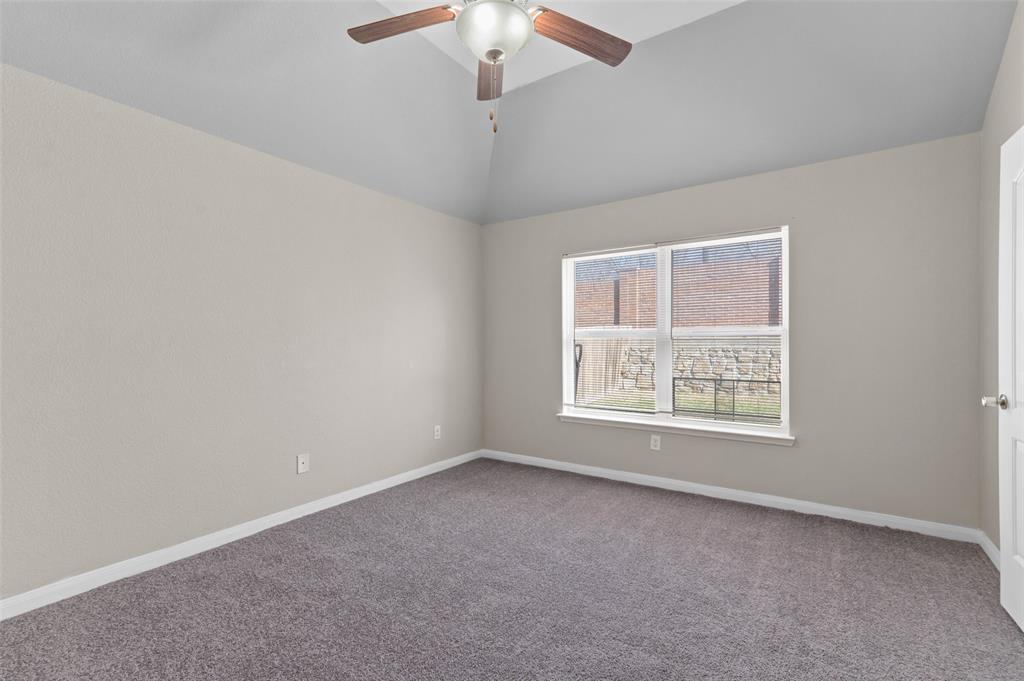 4700 Conley Lane Denton, TX 76207 - Photo 8 of 17 an empty room with a window