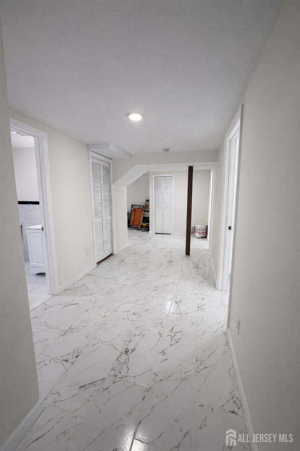 30 Falmouth Road Iselin, NJ 08830 - Photo 16 of 23 a view of a livingroom with wooden floor