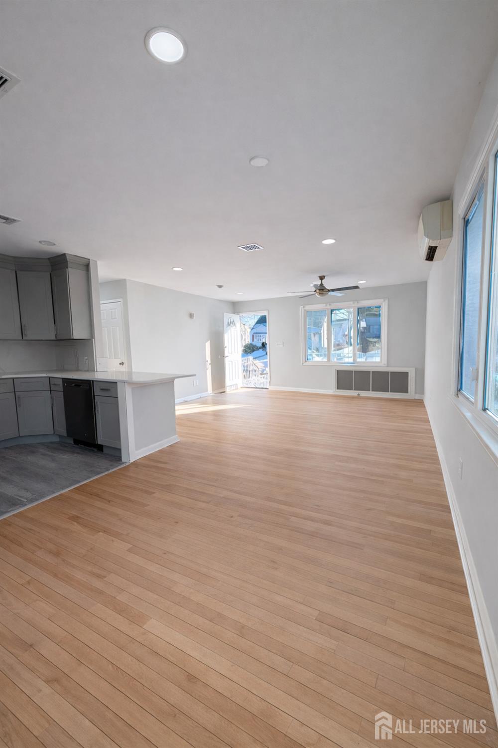 30 Falmouth Road Iselin, NJ 08830 - Photo 10 of 23 a view of an empty room with kitchen and window