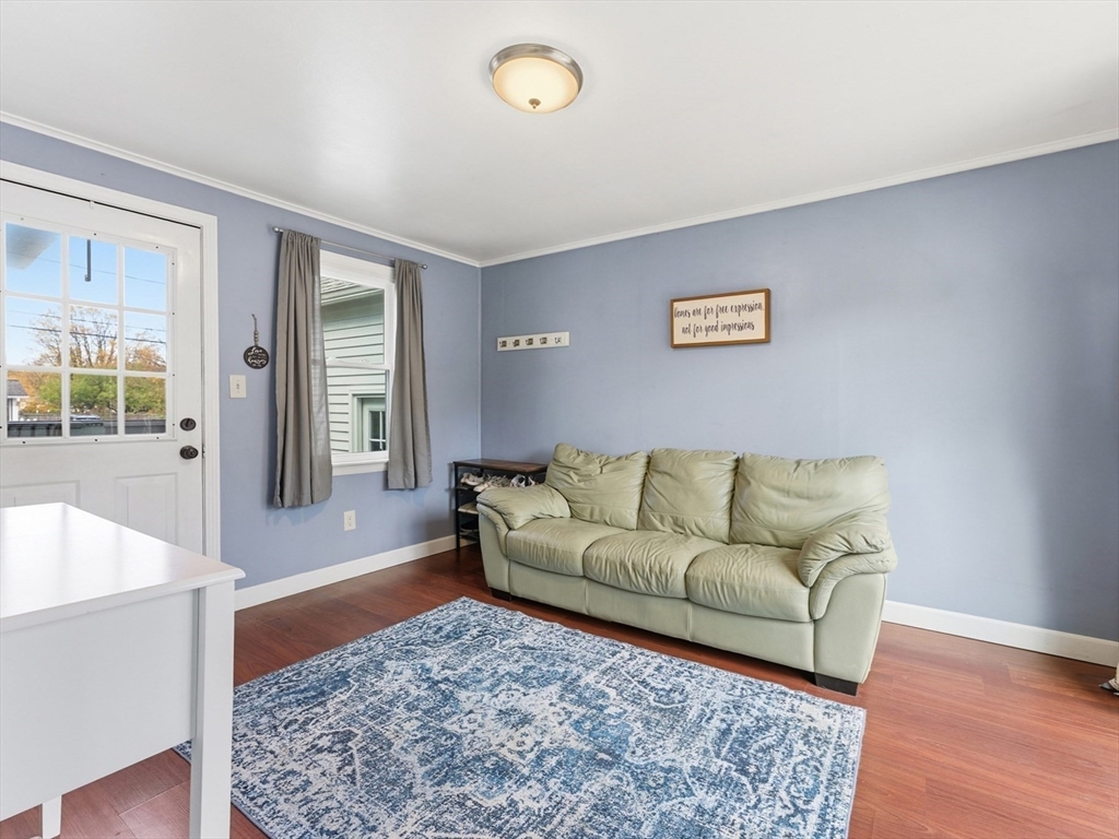 97 Robak Drive Chicopee, MA 01020 - Photo 14 of 41 a living room with furniture and a rug