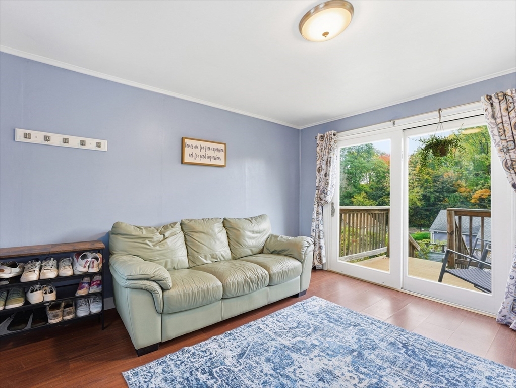 97 Robak Drive Chicopee, MA 01020 - Photo 16 of 41 a living room with furniture and a large window