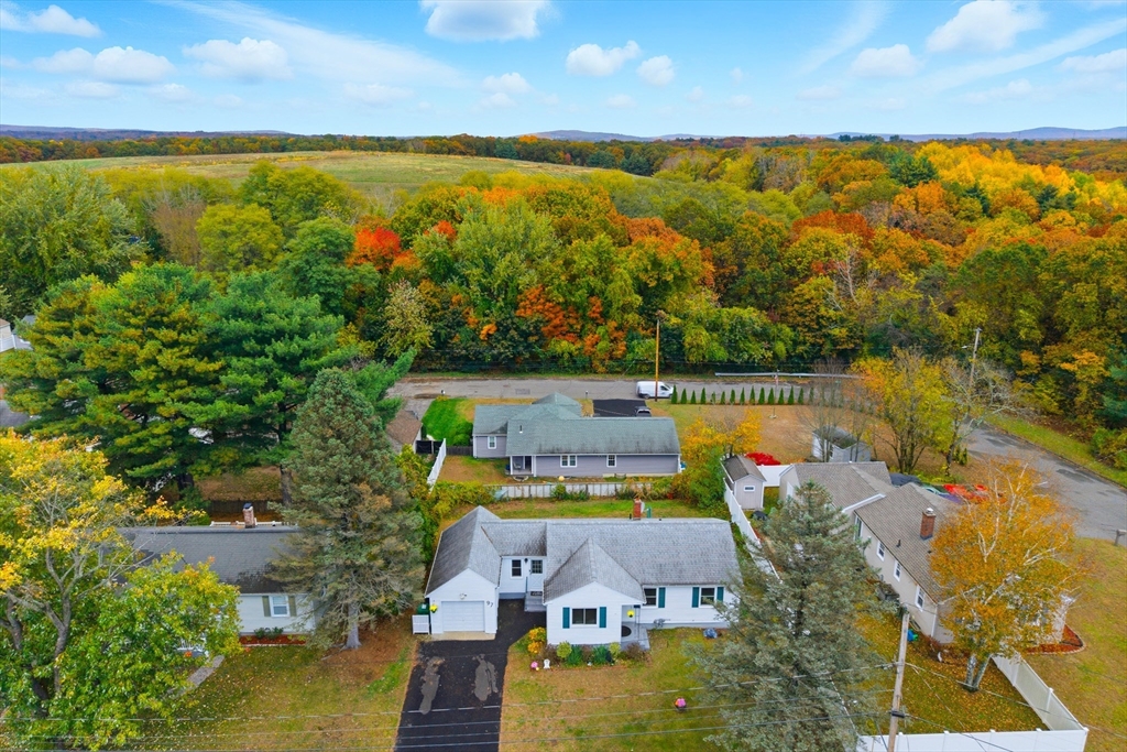 97 Robak Drive Chicopee, MA 01020 - Photo 2 of 41 an aerial view of residential houses with outdoor space and swimming pool
