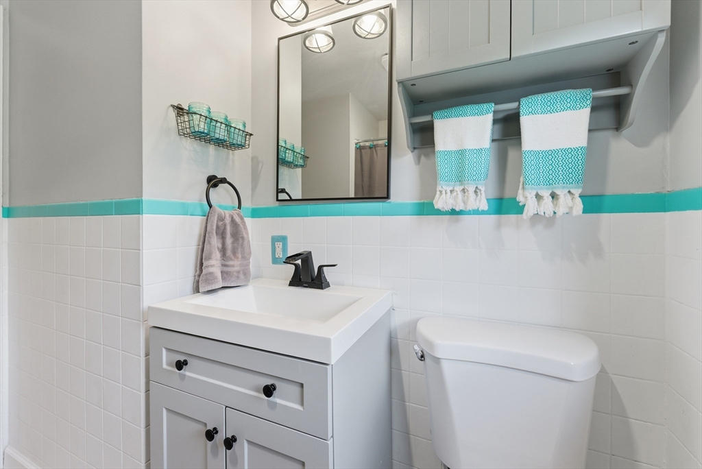 97 Robak Drive Chicopee, MA 01020 - Photo 29 of 41 a bathroom with a sink and a mirror