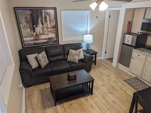 3760 Cedar Hurst Way Atlanta, GA 30349 - Photo 17 of 22 a living room with furniture and a flat screen tv