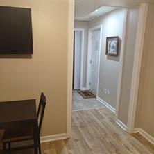 3760 Cedar Hurst Way Atlanta, GA 30349 - Photo 19 of 22 a view of room with a chair and frames on wall