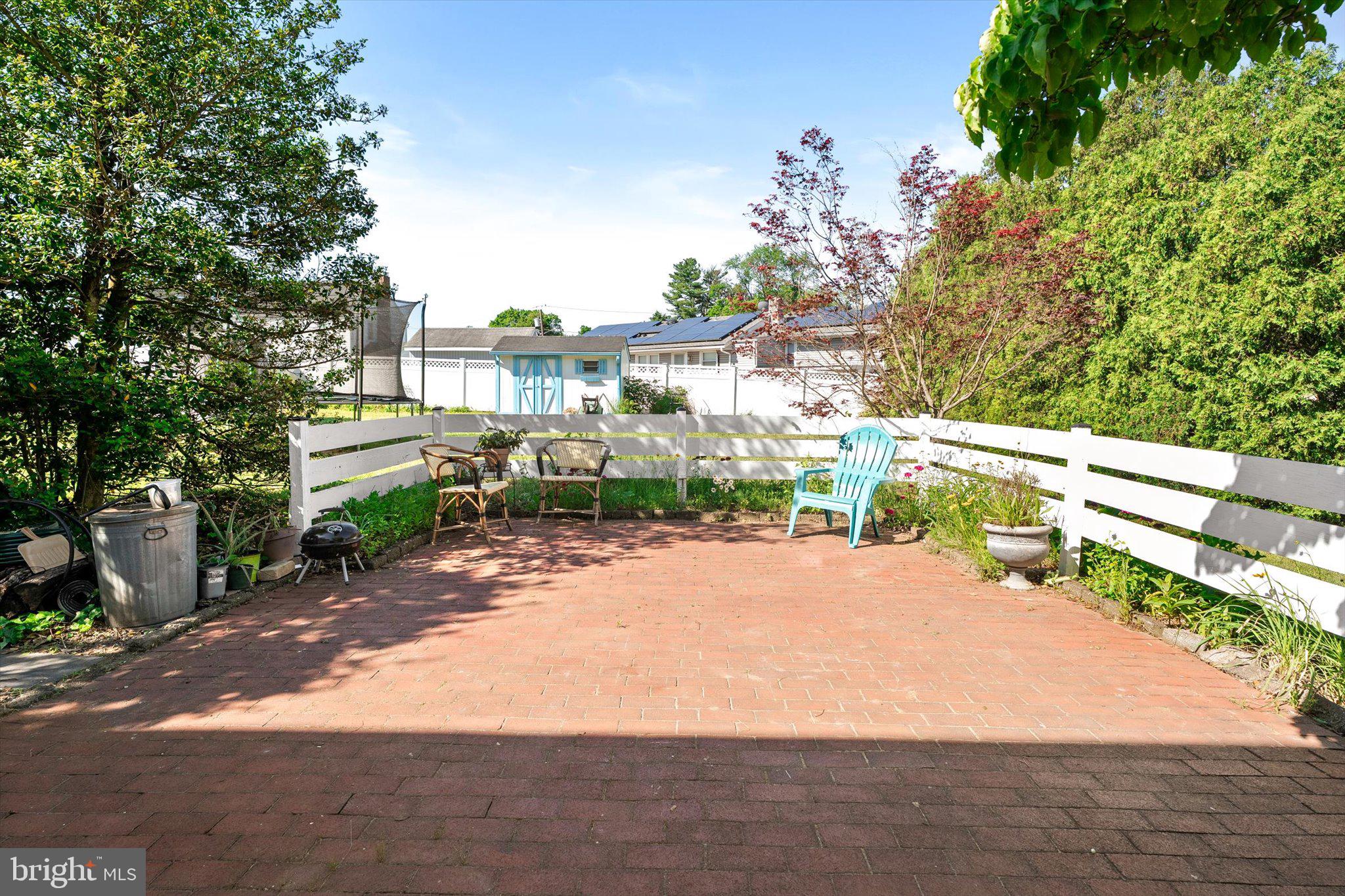 3639 State Extension Trenton, NJ 08619 - Photo 27 of 33 Sunny patio with lush greenery.