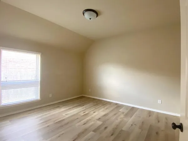 a bathroom with a sink a toilet and bathtub