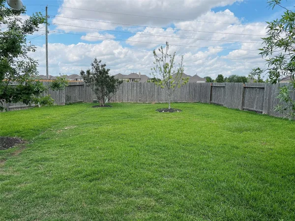 a view of a backyard with a garden