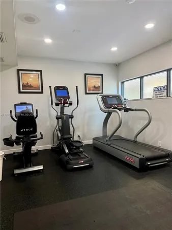 a view of a room with gym equipment