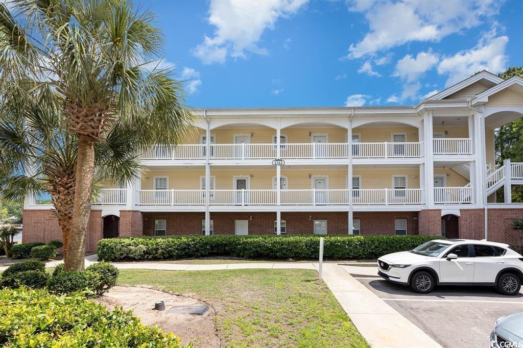 1512 Lanterns Rest Road, Unit 201 Myrtle Beach, SC 29579 - Photo 1 of 23 View of property with uncovered parking