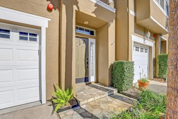 a view of a entryway door front of house