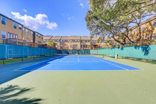 swimming pool view with a garden space