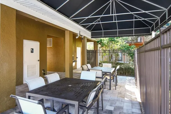 a view of outdoor space and yard from a balcony