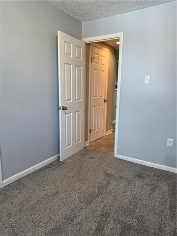a view of a storage & utility room with washing machine