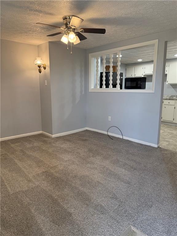 19 Studa Street, Unit 1 Burgettstown, PA 15021 - Photo 5 of 13 wooden floor in an empty room with a window