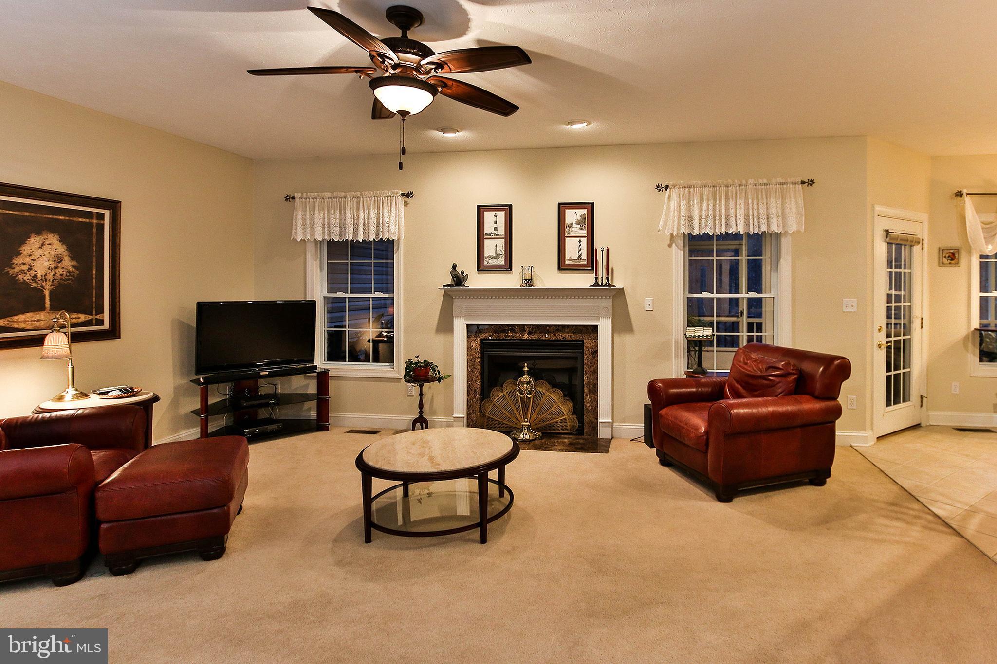 800 Cattail Road Winchester, VA 22603 - Photo 12 of 44 Spacious family room boasts a cozy gas fireplace