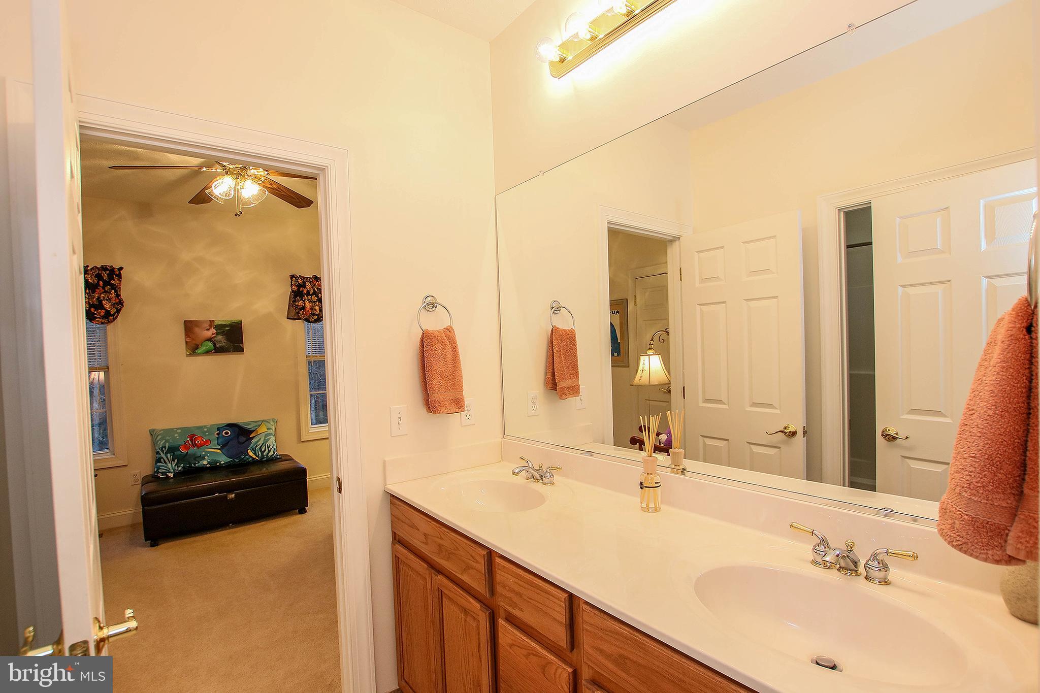 800 Cattail Road Winchester, VA 22603 - Photo 23 of 44 Jack and Jill bathroom connects both bedrooms