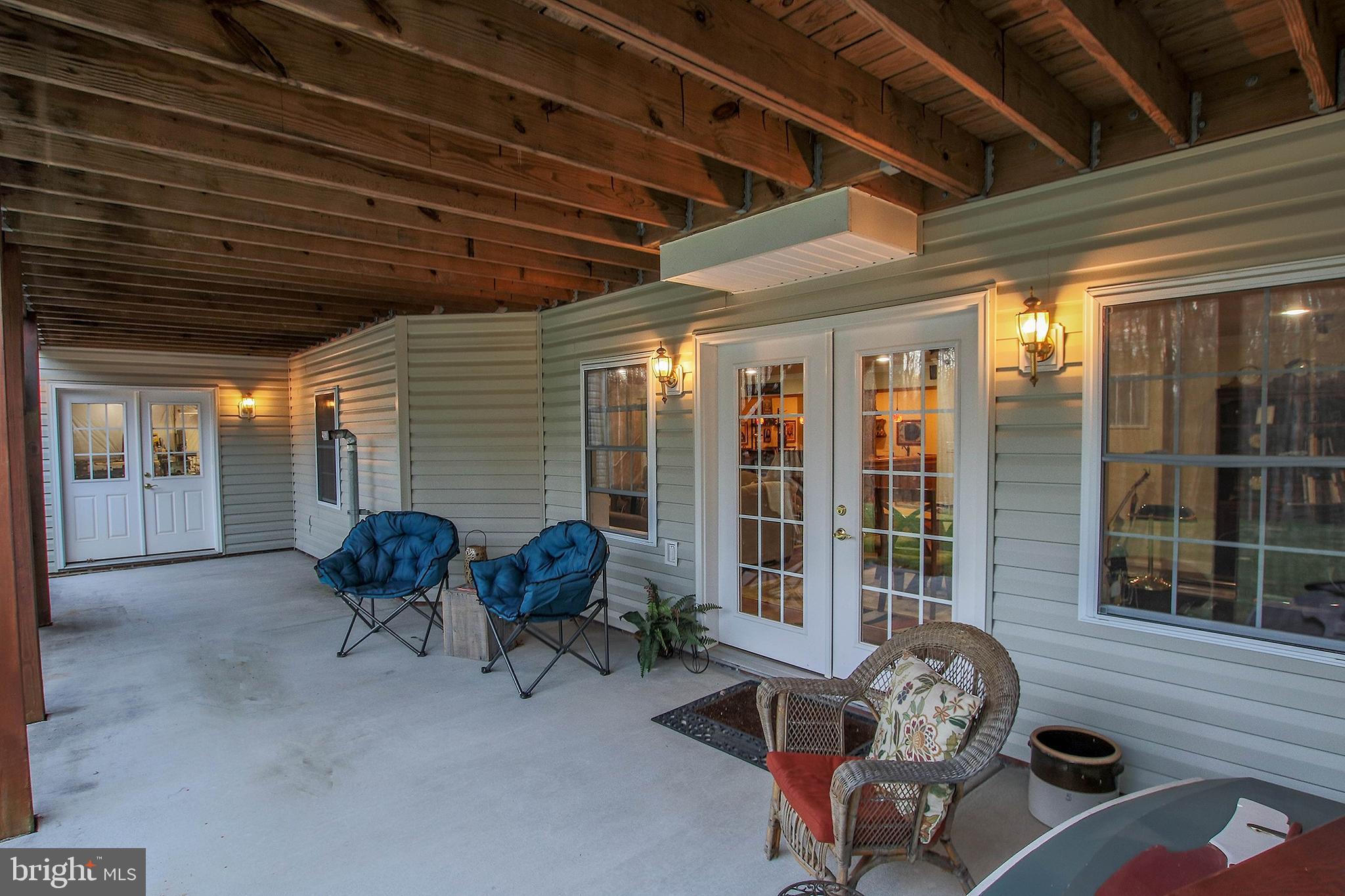 800 Cattail Road Winchester, VA 22603 - Photo 39 of 44 New concrete patio below the screened porch