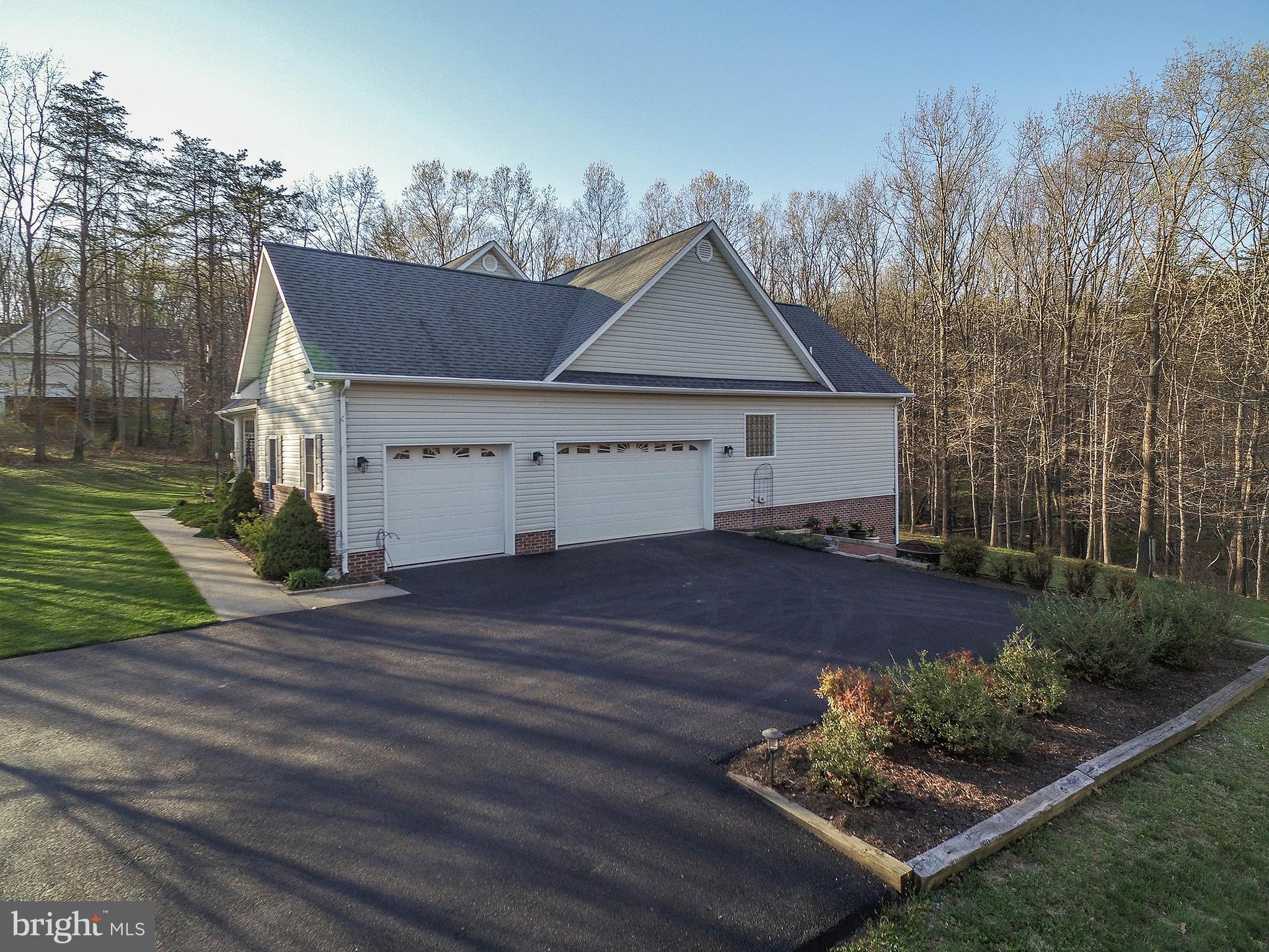 800 Cattail Road Winchester, VA 22603 - Photo 5 of 44 3 car side loading garage; newly sealed driveway