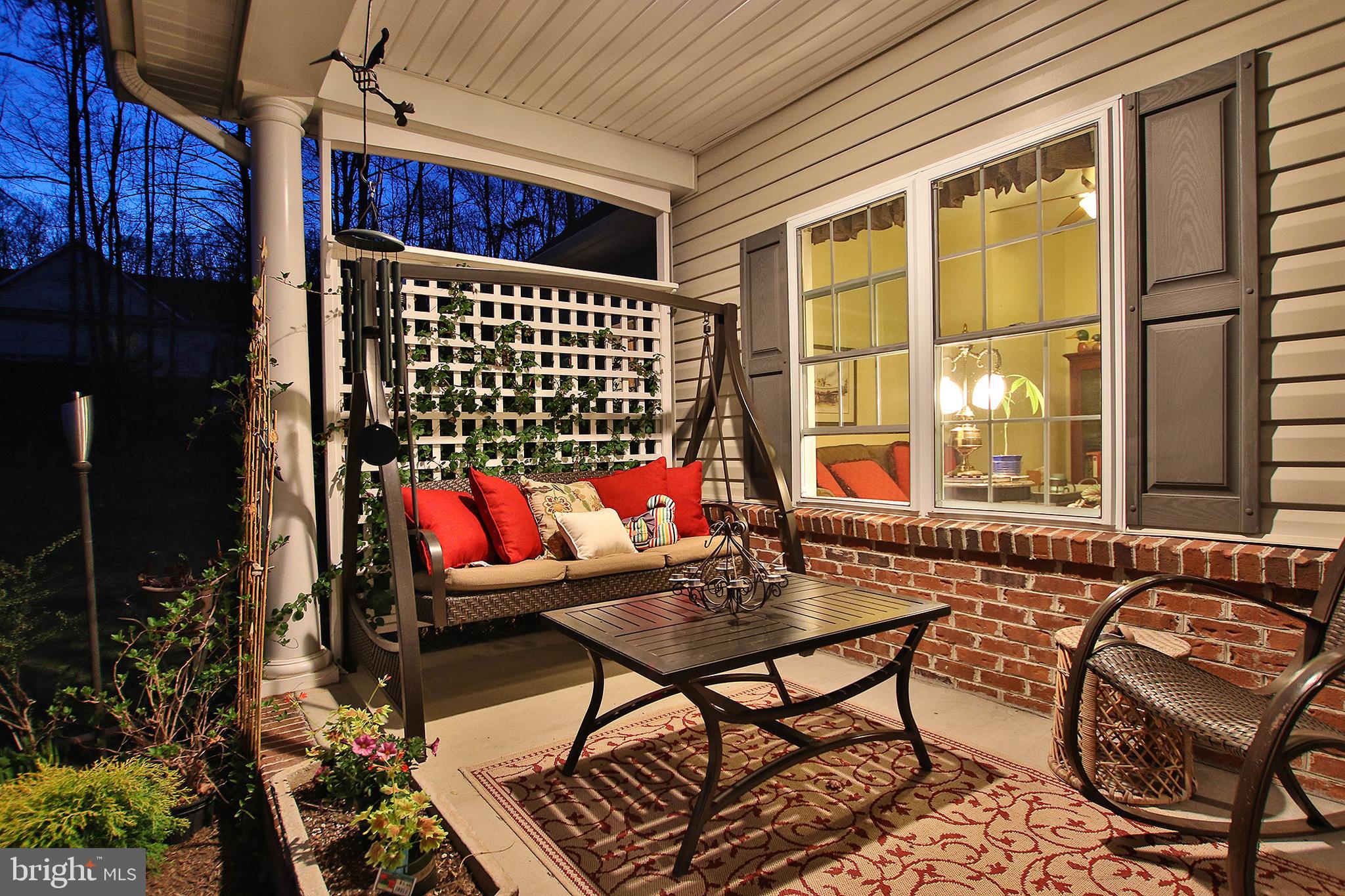 800 Cattail Road Winchester, VA 22603 - Photo 6 of 44 Enjoy gentle country evenings on your front porch