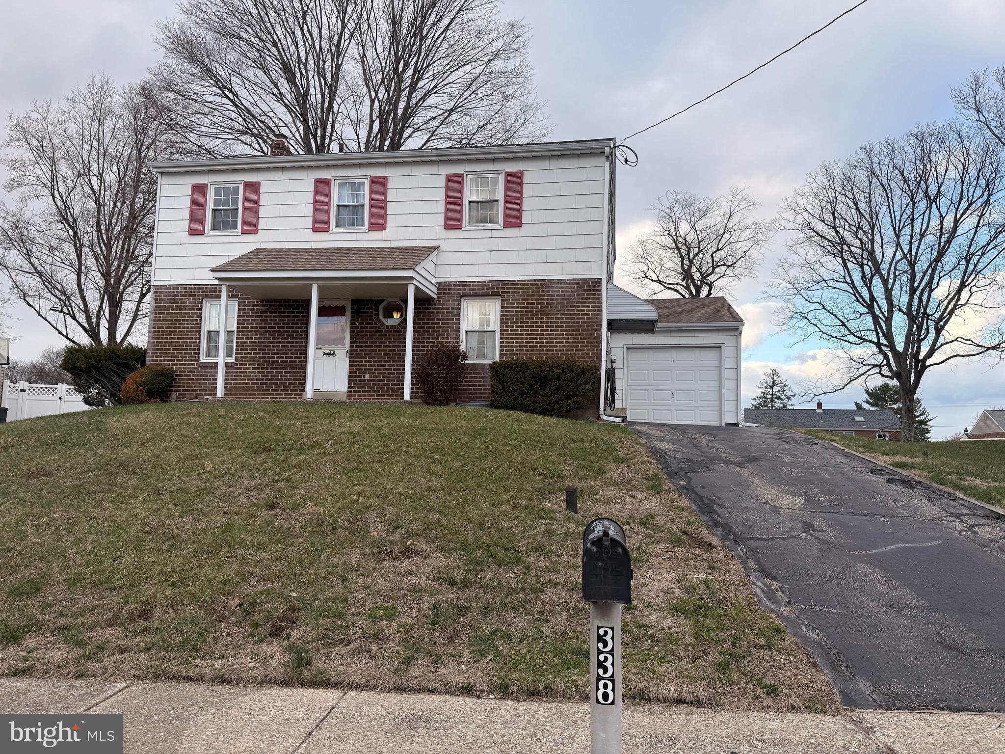 338 Rees Drive King of Prussia, PA 19406 - Photo 1 of 35 a front view of a house with garden