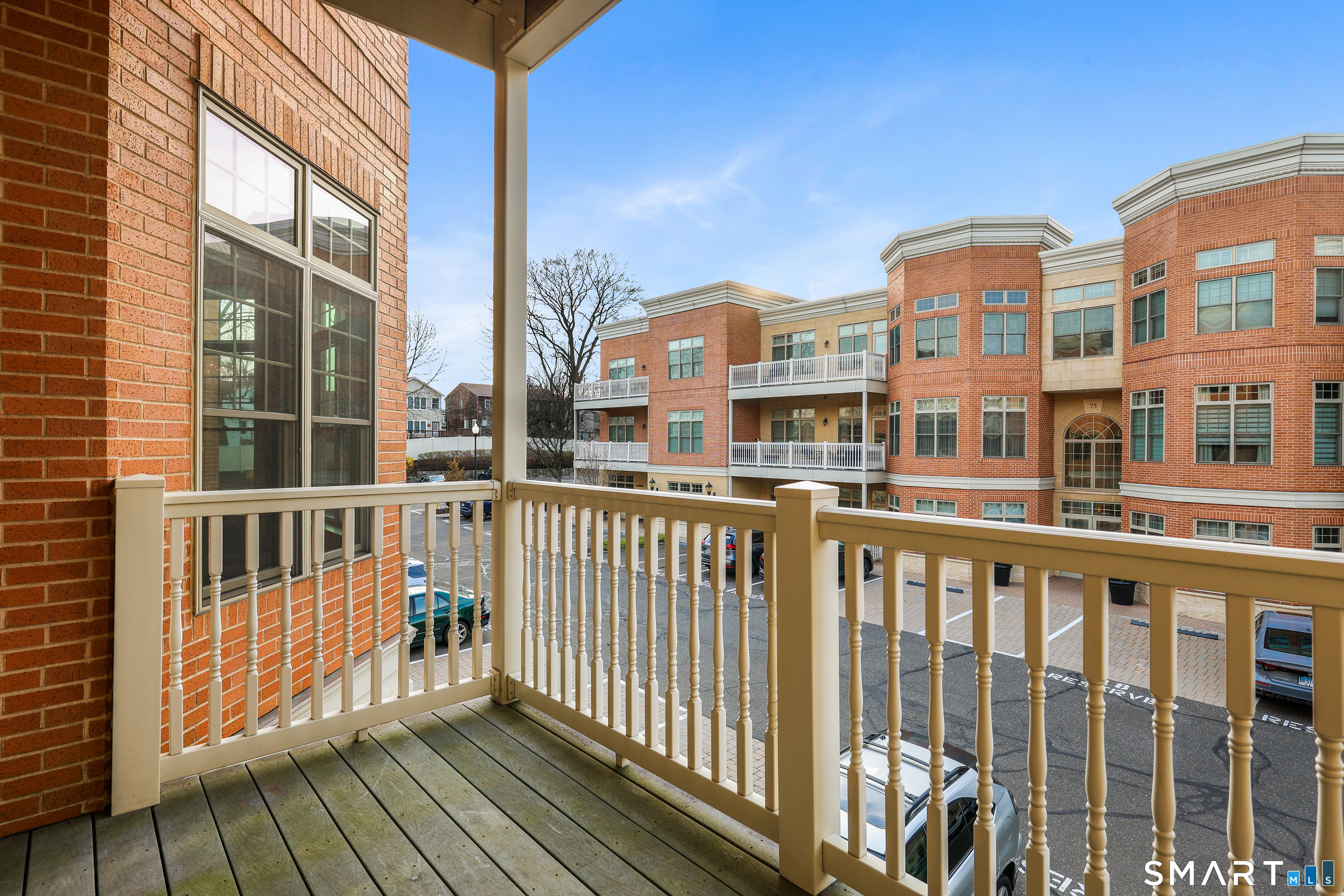 50 Stone Ridge Way, Unit 2A Fairfield, CT 06824 - Photo 19 of 36 a view of city from a balcony