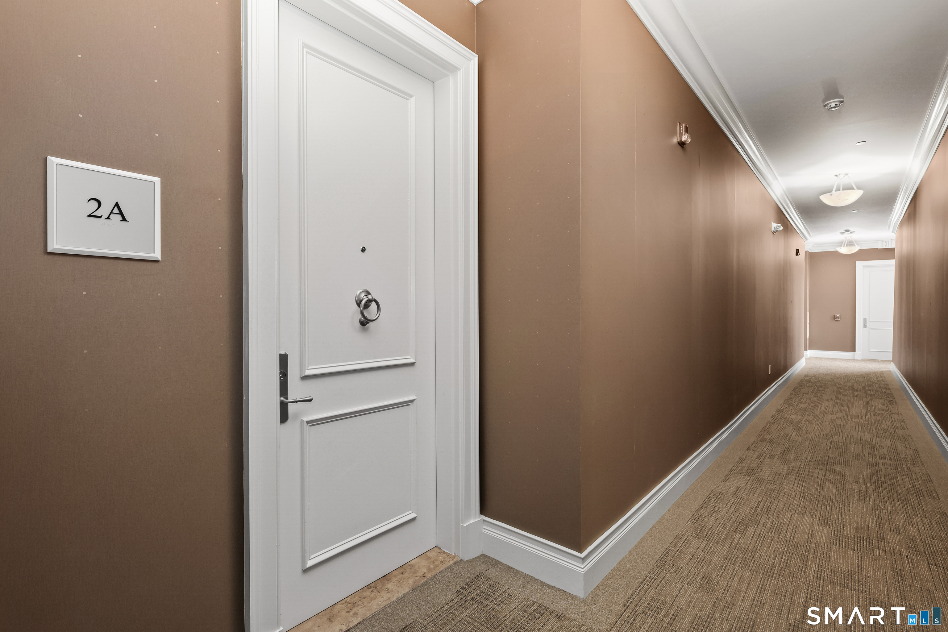 50 Stone Ridge Way, Unit 2A Fairfield, CT 06824 - Photo 2 of 36 a view of a hallway with closet