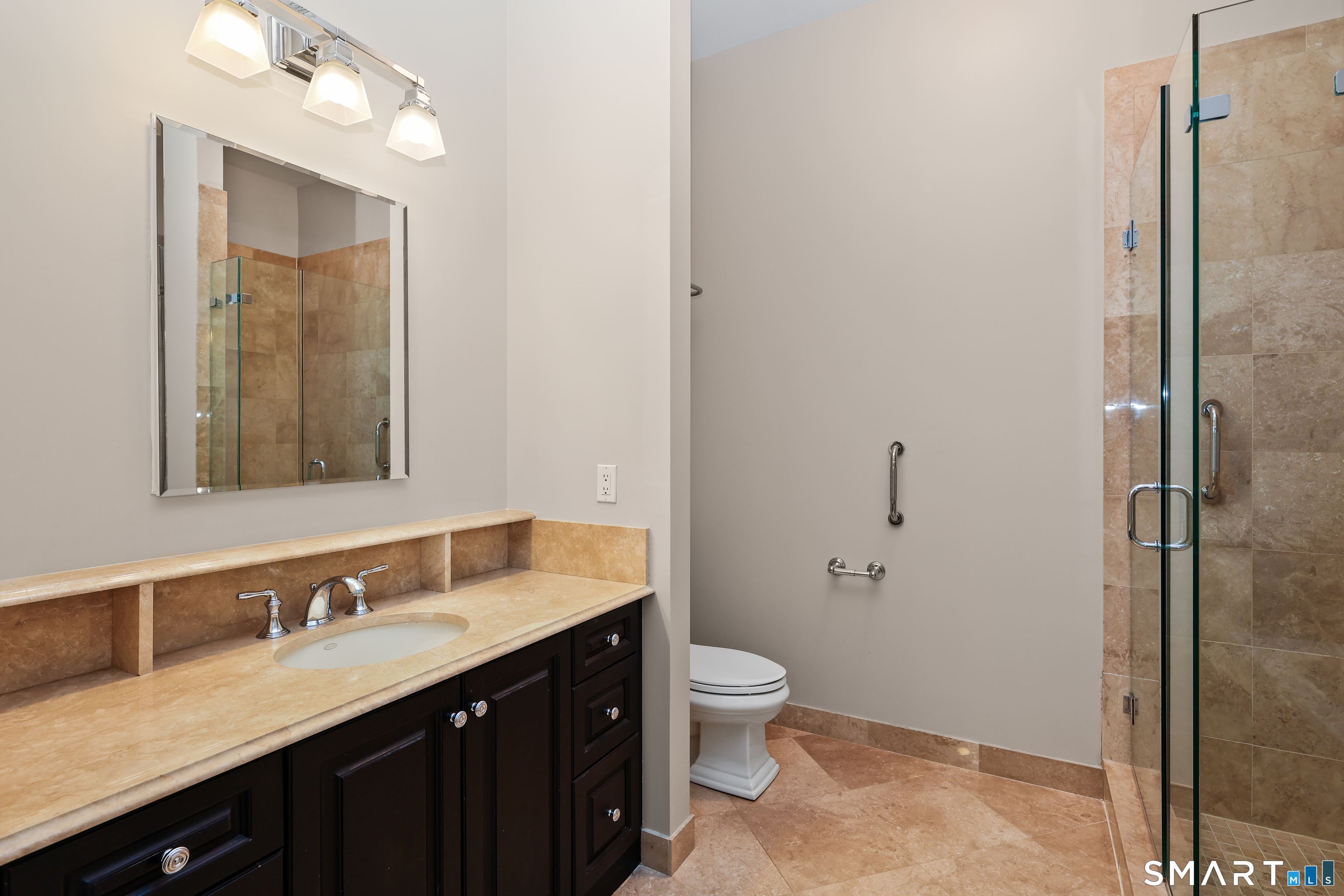 50 Stone Ridge Way, Unit 2A Fairfield, CT 06824 - Photo 21 of 36 a bathroom with a granite countertop sink toilet and shower