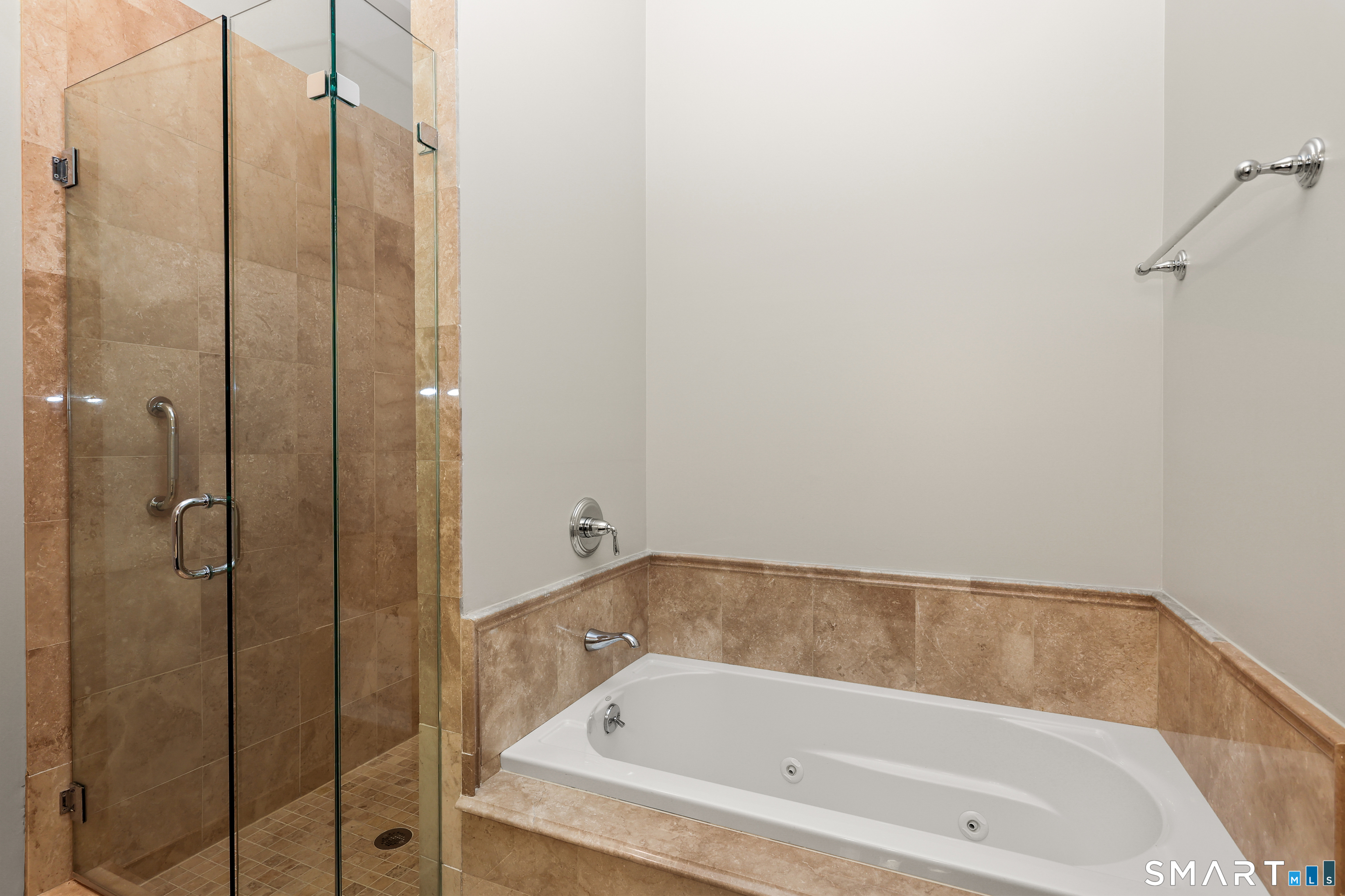 50 Stone Ridge Way, Unit 2A Fairfield, CT 06824 - Photo 23 of 36 a bathroom with a bathtub