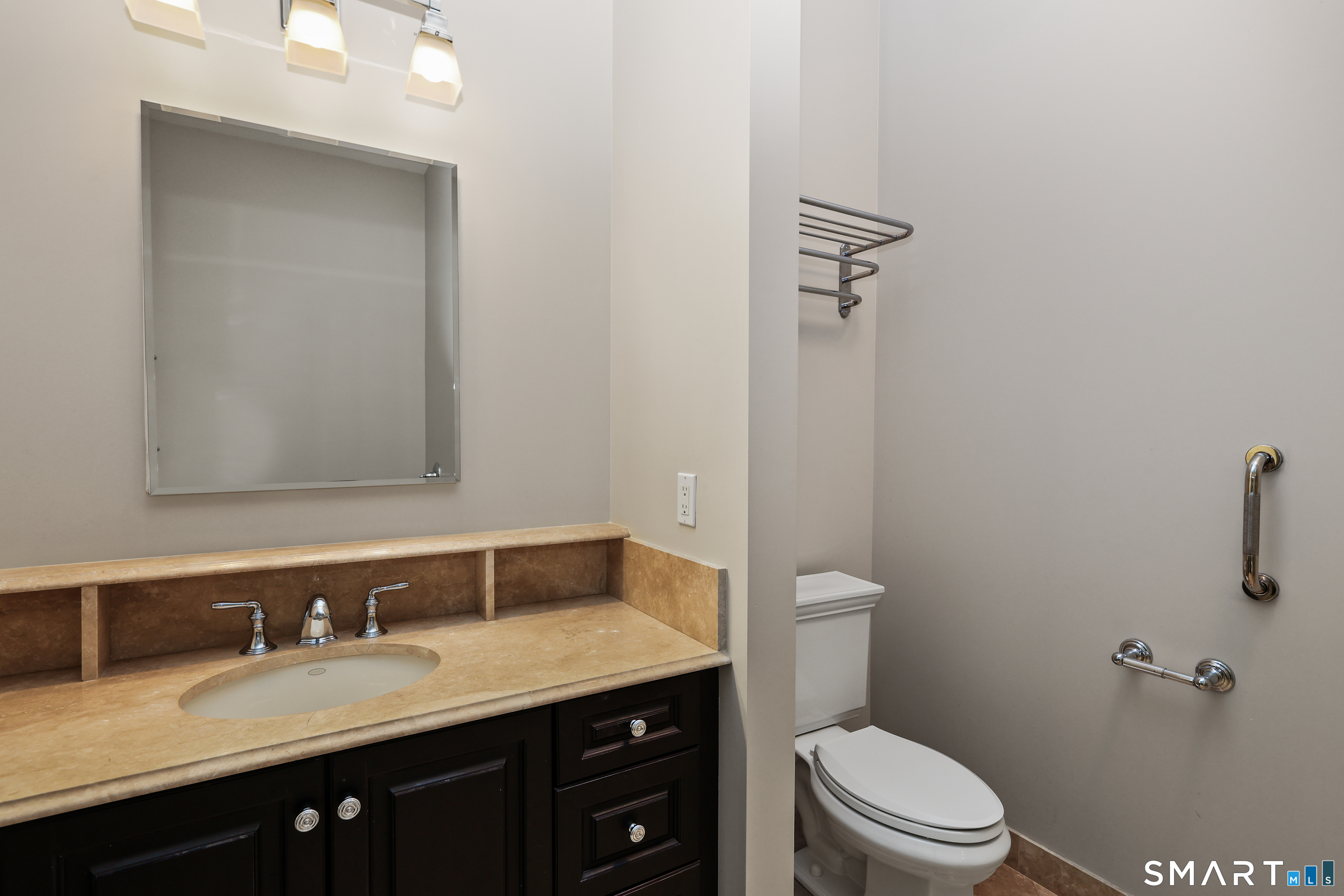50 Stone Ridge Way, Unit 2A Fairfield, CT 06824 - Photo 24 of 36 a bathroom with a granite countertop sink toilet a large mirror and shower