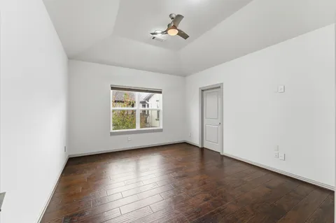 a bathroom with a shower and a toilet
