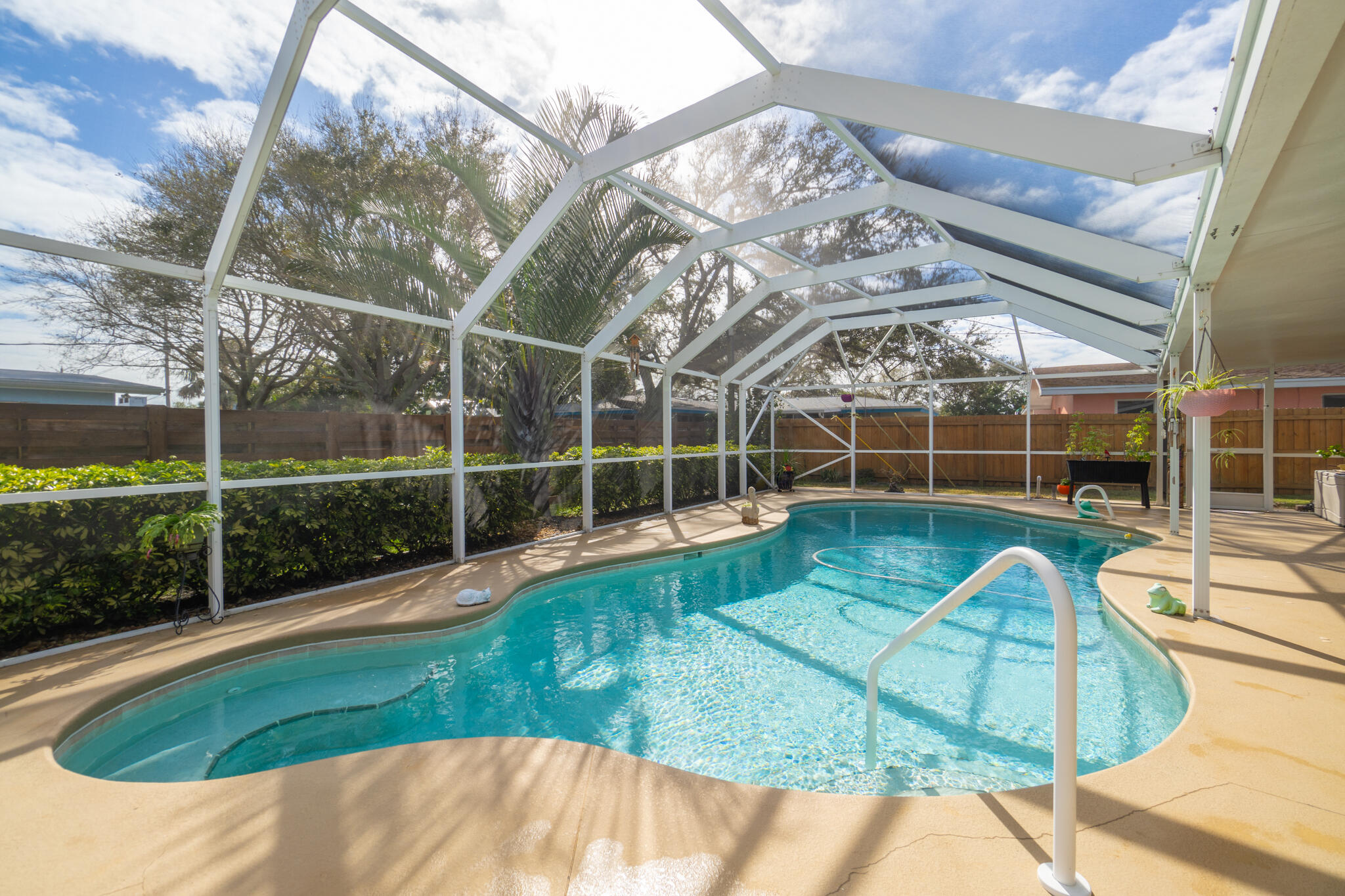 560 Capri Road Cocoa Beach, FL 32931 - Photo 2 of 31 a view of a house with a backyard