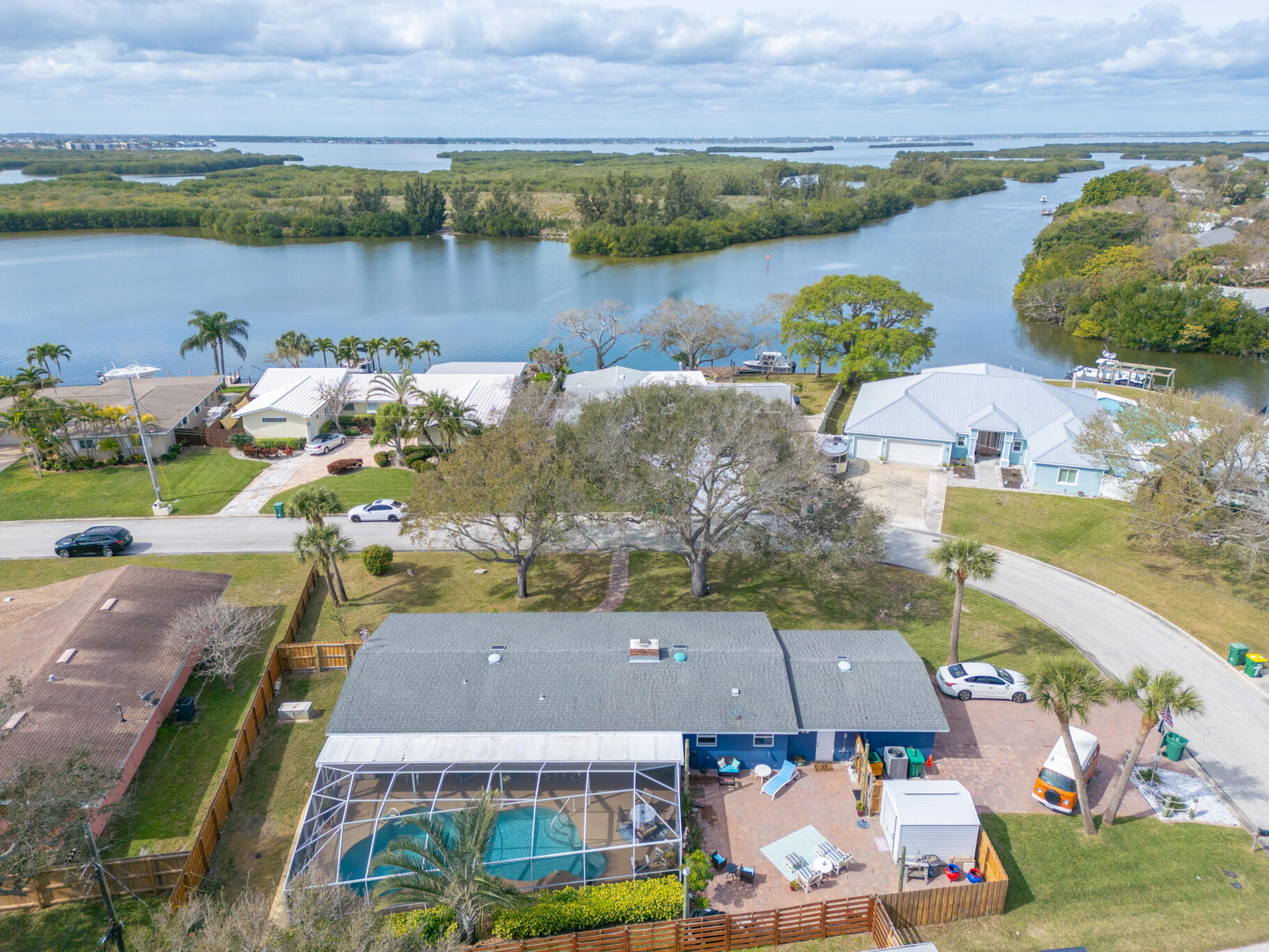 560 Capri Road Cocoa Beach, FL 32931 - Photo 26 of 31 an aerial view of a house with a lake view