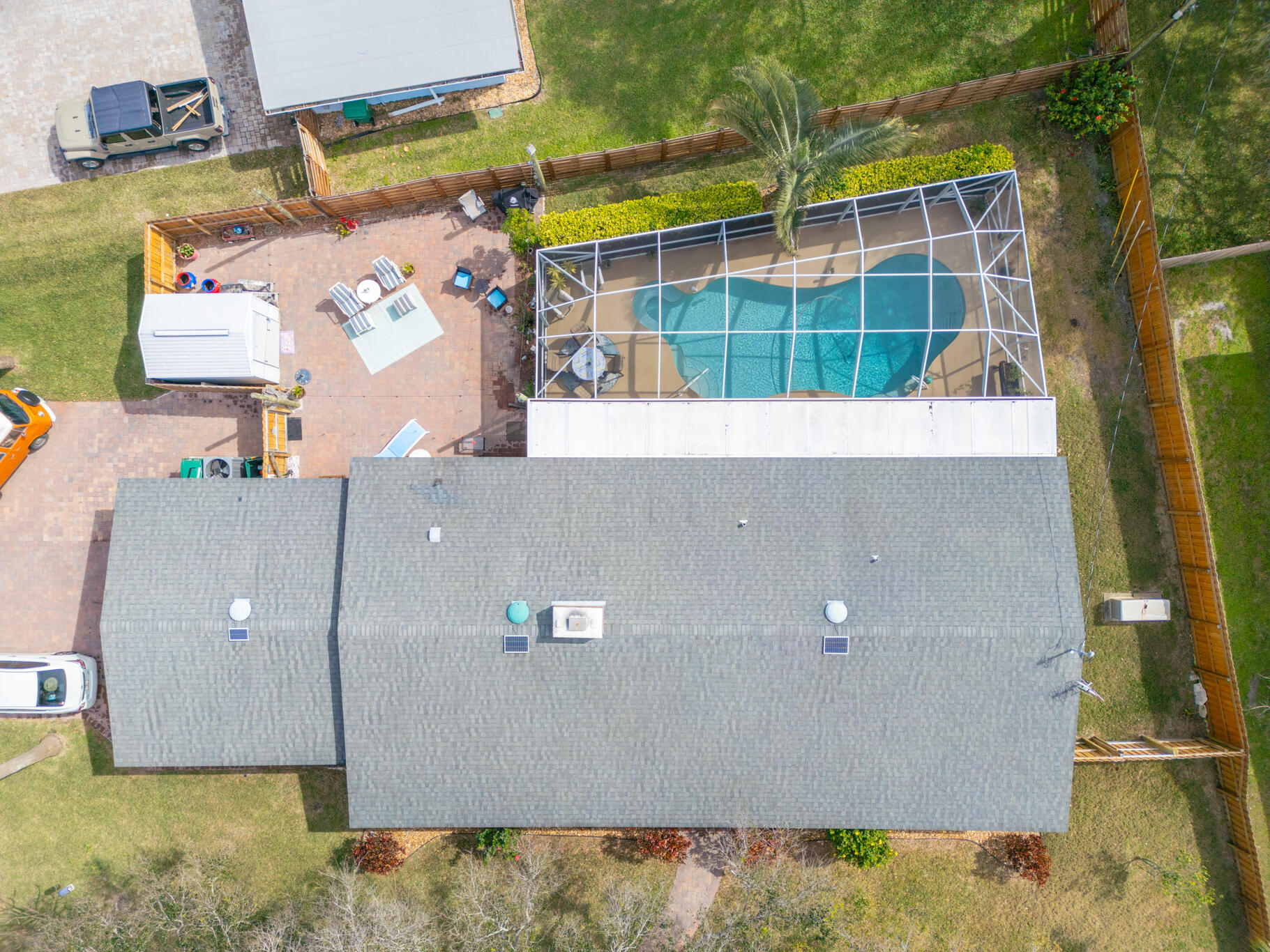 560 Capri Road Cocoa Beach, FL 32931 - Photo 28 of 31 view of a room with wooden floor and windows