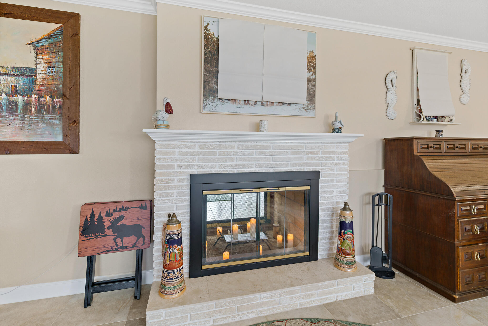 560 Capri Road Cocoa Beach, FL 32931 - Photo 7 of 31 a living room with furniture and a fireplace