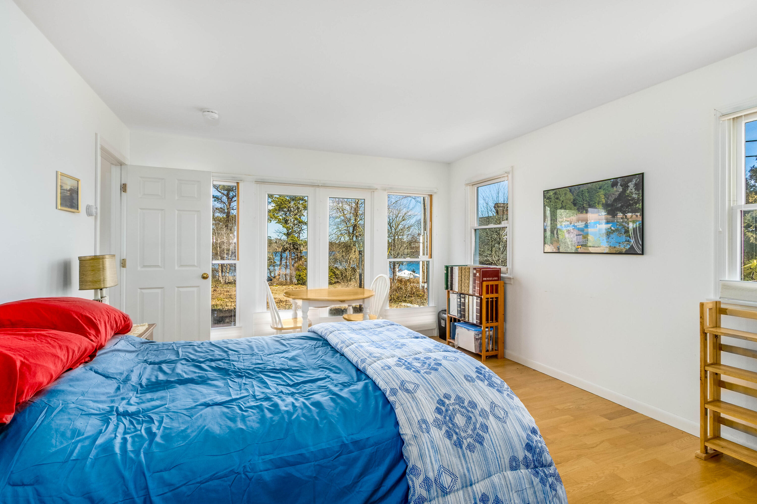 104 Seapine Road North Chatham, MA 02650 - Photo 19 of 36 a bedroom with a large bed and a large window