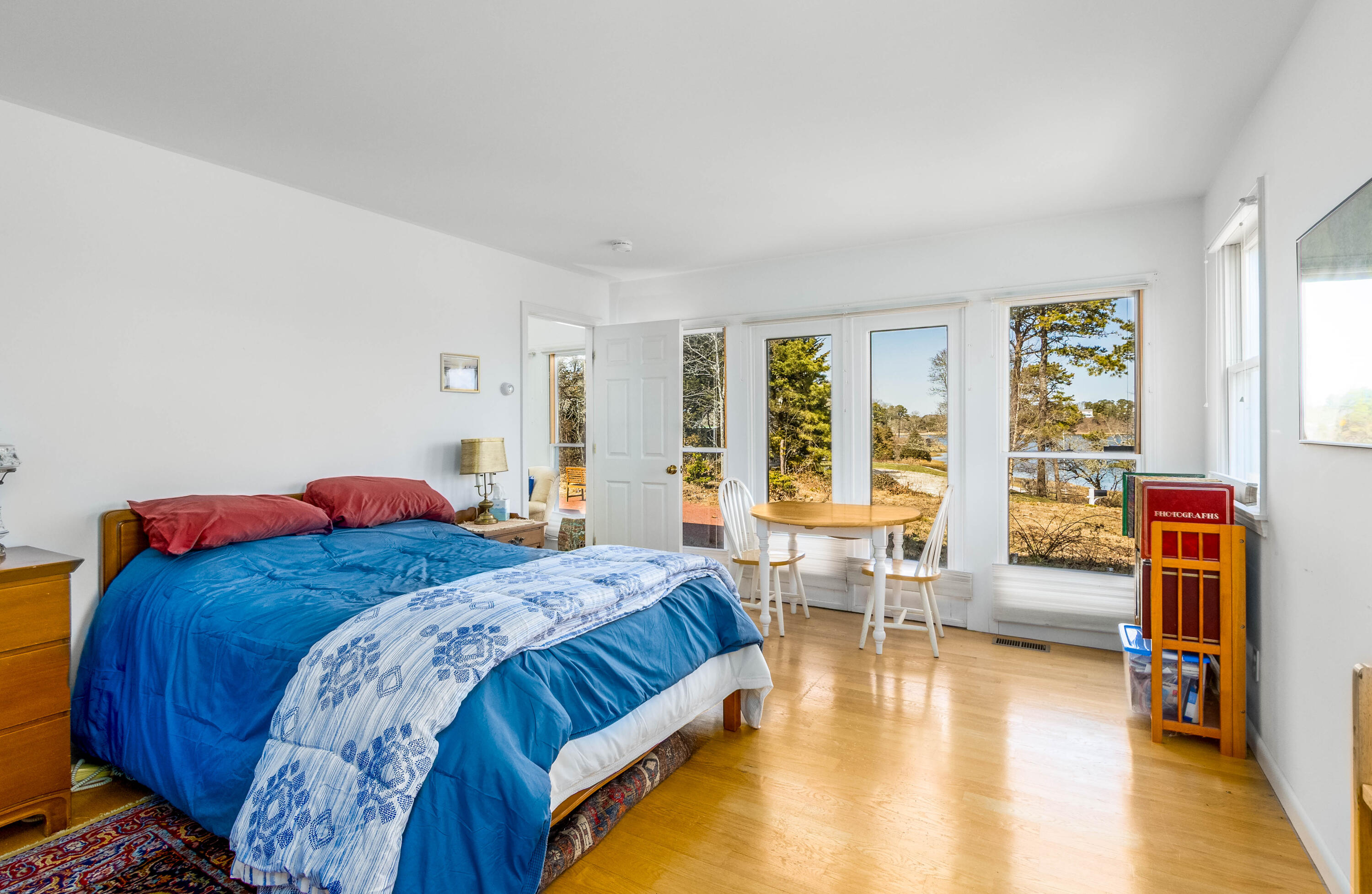 104 Seapine Road North Chatham, MA 02650 - Photo 20 of 36 a bedroom with a bed and wooden floor