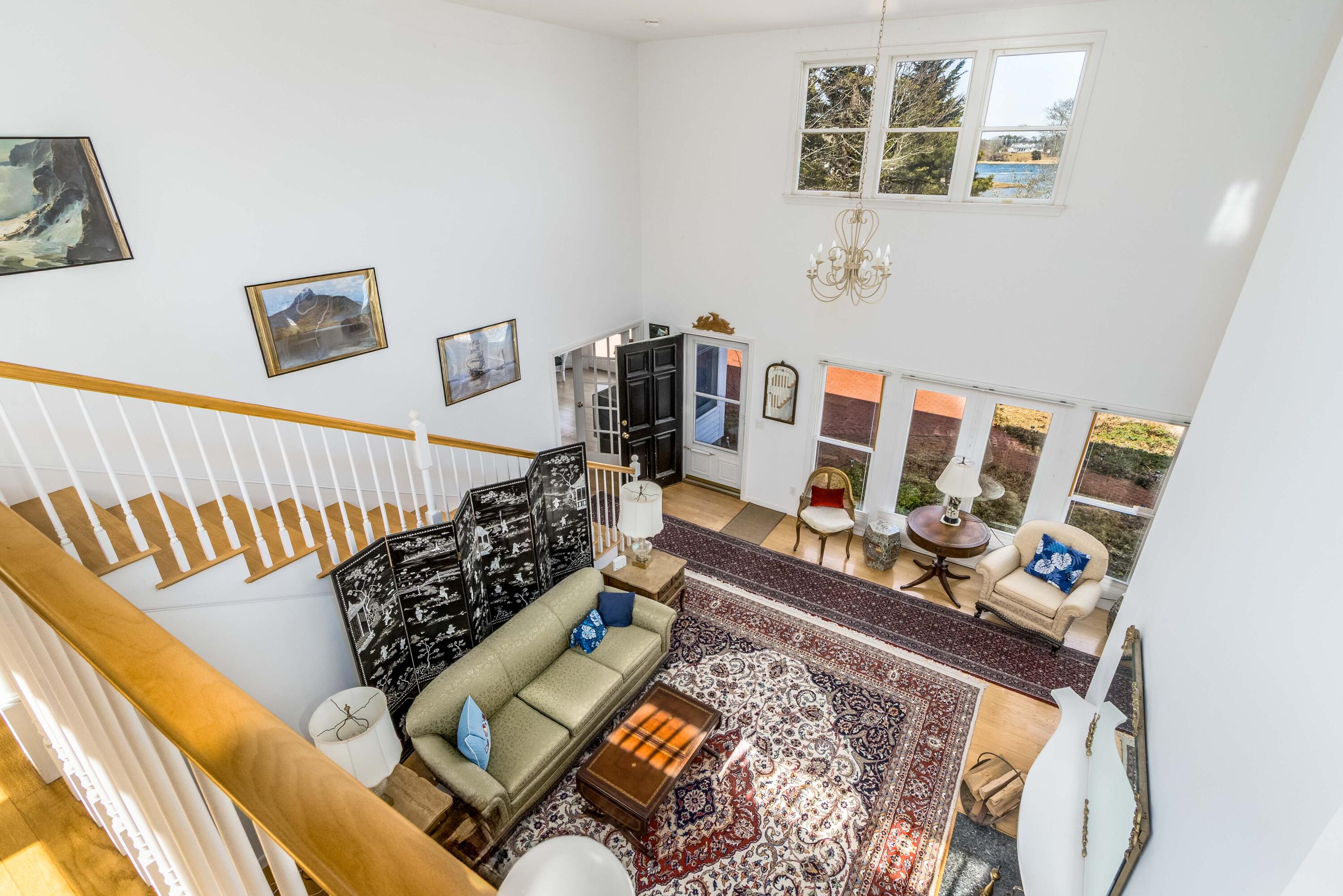 104 Seapine Road North Chatham, MA 02650 - Photo 22 of 36 a bed room with a bed and a wooden floor
