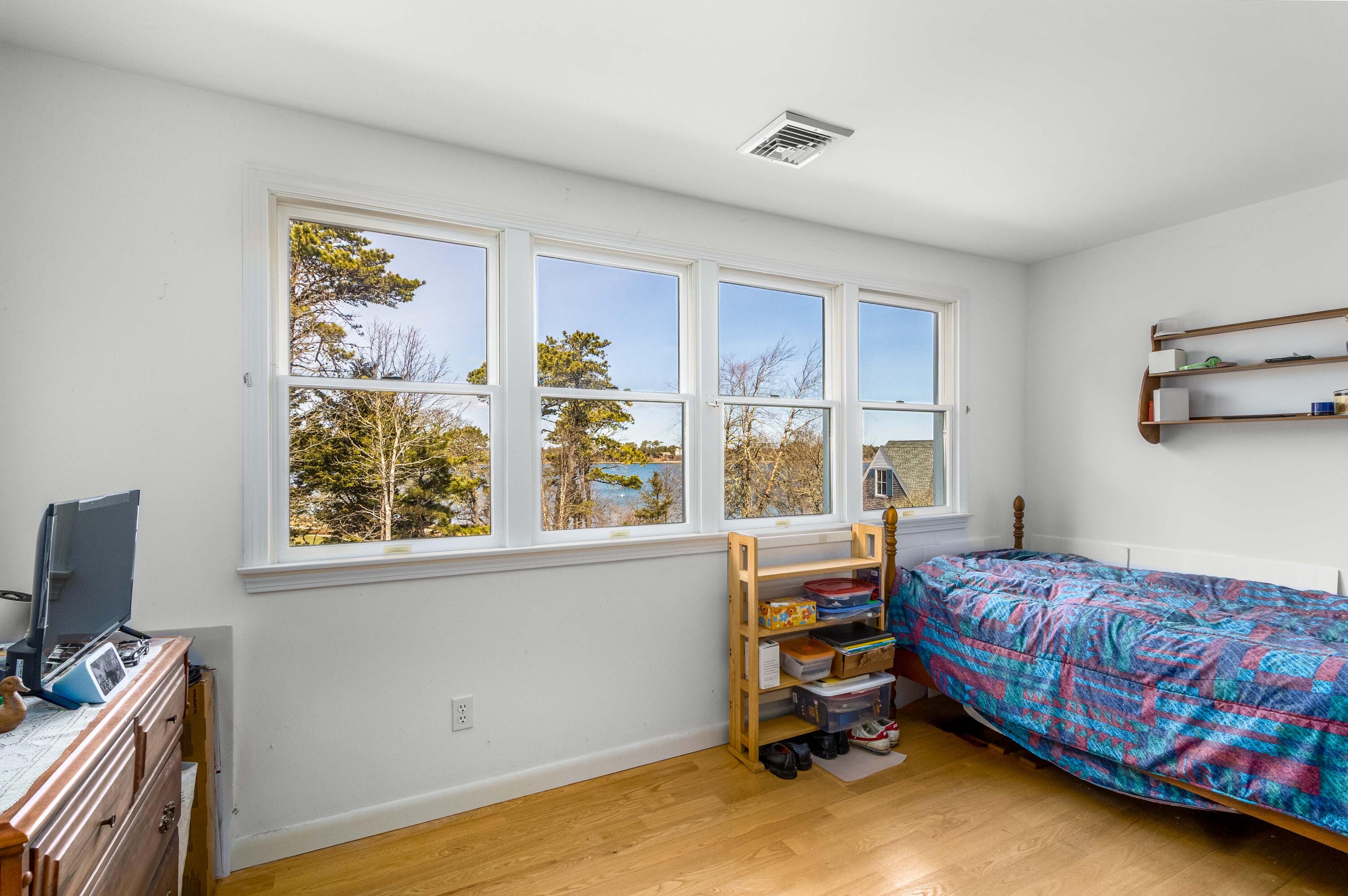 104 Seapine Road North Chatham, MA 02650 - Photo 23 of 36 a bedroom with a bed and a window